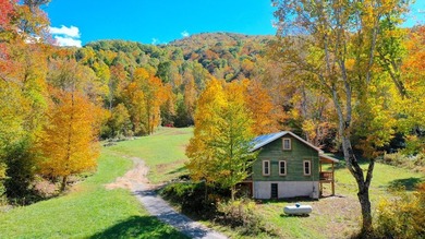 Welcome to an extraordinary 100+ acre mountain homestead nestled - photo 12