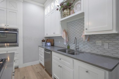 Welcome to this exceptional 6 bedroom, 6 bath residence designed - photo 13