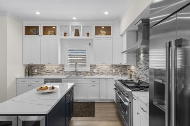 Coastal elegance just steps from the Gulf! 407 Petrel Ave blends - photo 14