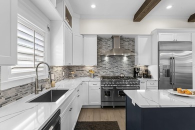 Coastal elegance just steps from the Gulf! 407 Petrel Ave blends - photo 15