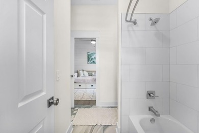 Coastal elegance just steps from the Gulf! 407 Petrel Ave blends - photo 35