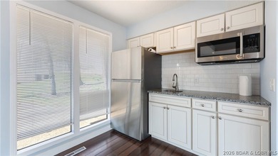 Cove location with sweeping main channel views makes this - photo 43