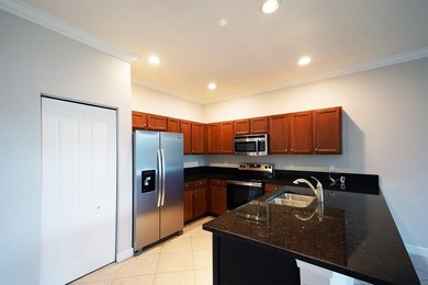 Welcome to this charming 4-bedroom, 2.5-bathroom townhouse - photo 8