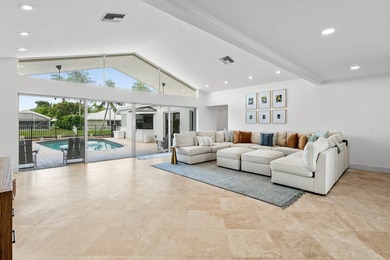 Welcome to this exceptional single-story waterfront residence in - photo 6