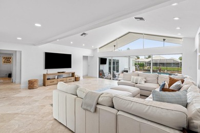 Welcome to this exceptional single-story waterfront residence in - photo 7