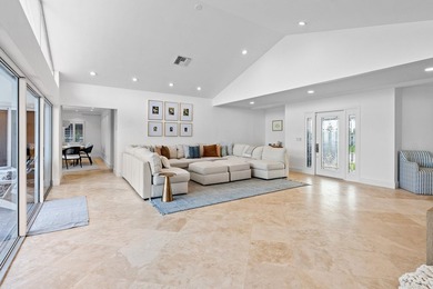 Welcome to this exceptional single-story waterfront residence in - photo 8