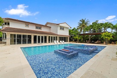 Stunning two-story estate in Miami on nearly an acre, featuring - photo 2