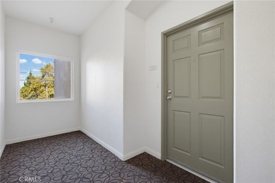 Welcome to this spacious 3-bedroom, 2.5-bath corner-unit - photo 2