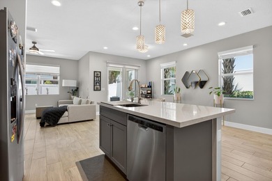 Beautifully upgraded 4BR / 2.5BA corner unit featuring an - photo 5
