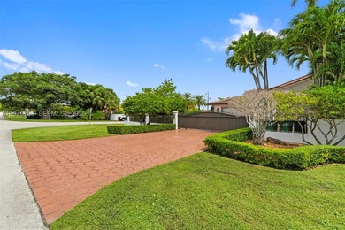 Stunning two-story estate in Miami on nearly an acre, featuring - photo 6