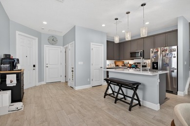 Beautifully upgraded 4BR / 2.5BA corner unit featuring an - photo 8