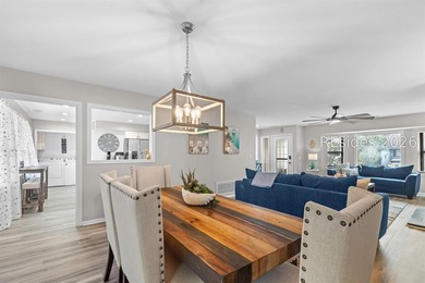 This beautifully updated residence offers laminate wood flooring - photo 13