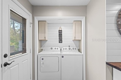 This beautifully updated residence offers laminate wood flooring - photo 20