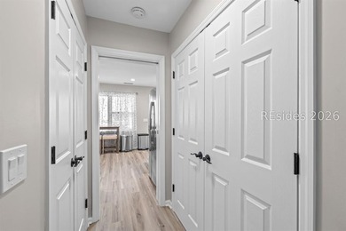 This beautifully updated residence offers laminate wood flooring - photo 21