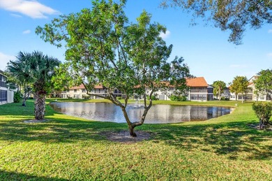 STUNNING LAKESIDE RENOVATION! 1st-floor condo offers expansive - photo 1