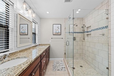 This beautifully updated residence offers laminate wood flooring - photo 24
