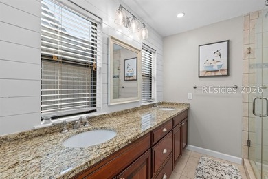 This beautifully updated residence offers laminate wood flooring - photo 25