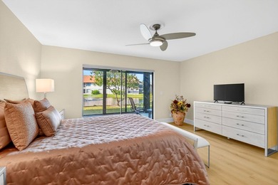 STUNNING LAKESIDE RENOVATION! 1st-floor condo offers expansive - photo 7