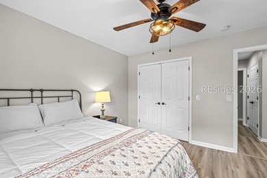 This beautifully updated residence offers laminate wood flooring - photo 28