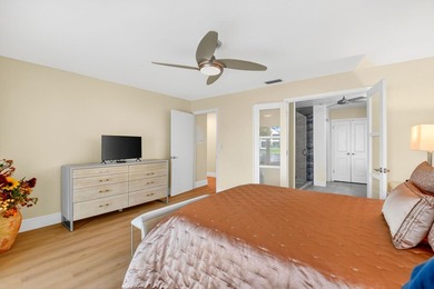 STUNNING LAKESIDE RENOVATION! 1st-floor condo offers expansive - photo 8