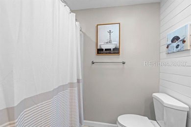 This beautifully updated residence offers laminate wood flooring - photo 33