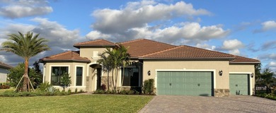 Stunning 4 bedroom/ 3.5 bath on .42 acres in the gated community - photo 1