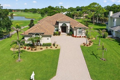 Stunning beautifully designed 4/2.5/3 pool home located on the - photo 1
