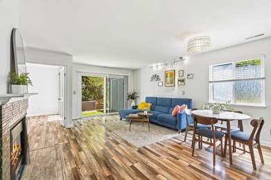 Tucked within a quiet Live Oak townhome community, this - photo 2