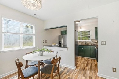 Tucked within a quiet Live Oak townhome community, this - photo 3