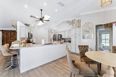 Welcome to this beautifully updated 4-bedroom, 3-bathroom home - photo 12