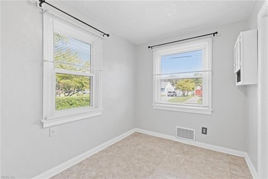 Charming bungalow with raised garden beds awaits! This - photo 6