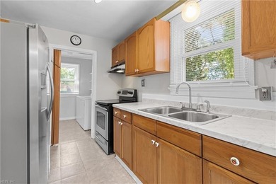 Charming bungalow with raised garden beds awaits! This - photo 8