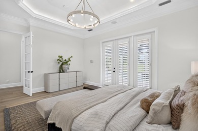 Luxury 4BR/4BA golf course home with lake views in the gated - photo 39