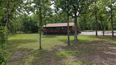 Tucked away in the beautiful Ozarks near Bull Shoals Lake, this - photo 2