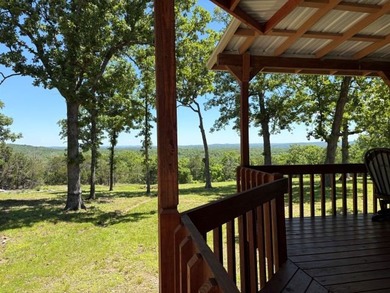 Tucked away in the beautiful Ozarks near Bull Shoals Lake, this - photo 4