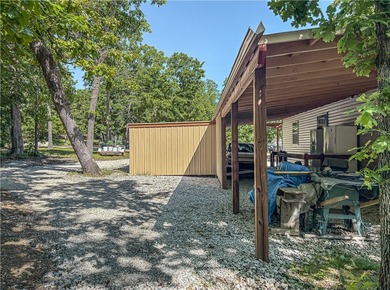 Tucked away in the beautiful Ozarks near Bull Shoals Lake, this - photo 10