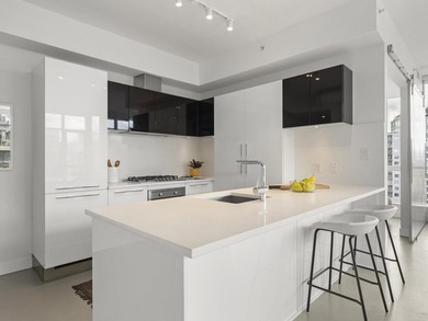 Perched on the coveted NW comer of the sub-penthouse level, this - photo 7