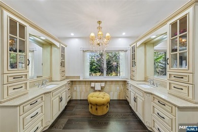 Welcome to this grand 7-bedroom manor located in the prestigious - photo 12