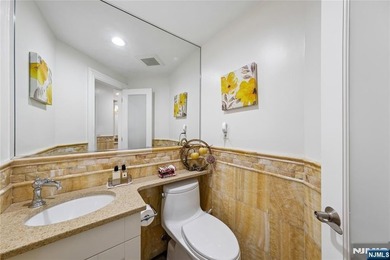 Welcome to this grand 7-bedroom manor located in the prestigious - photo 13