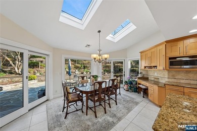 Welcome to this grand 7-bedroom manor located in the prestigious - photo 17