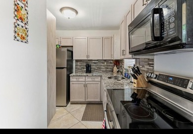 Beautifully maintained 2-bedroom, 1-bath condo offering comfort - photo 8