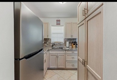 Beautifully maintained 2-bedroom, 1-bath condo offering comfort - photo 9