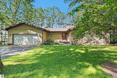 Nestled on 99 feet of Van Ettan Lake frontage and surrounded by - photo 2