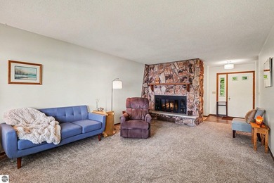 Nestled on 99 feet of Van Ettan Lake frontage and surrounded by - photo 3