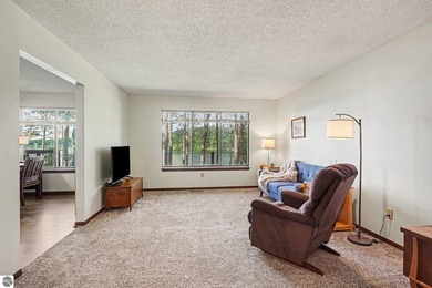 Nestled on 99 feet of Van Ettan Lake frontage and surrounded by - photo 4
