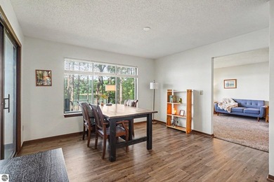 Nestled on 99 feet of Van Ettan Lake frontage and surrounded by - photo 5