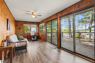 Nestled on 99 feet of Van Ettan Lake frontage and surrounded by - photo 8