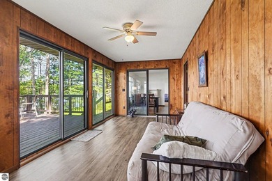 Nestled on 99 feet of Van Ettan Lake frontage and surrounded by - photo 9