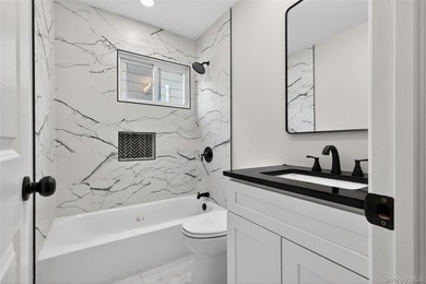 Beautifully renovated 4-bedroom Hi-Ranch offering exceptional - photo 18