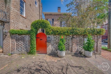 Recently refreshed, this rare, freestanding, 2-story brick - photo 3